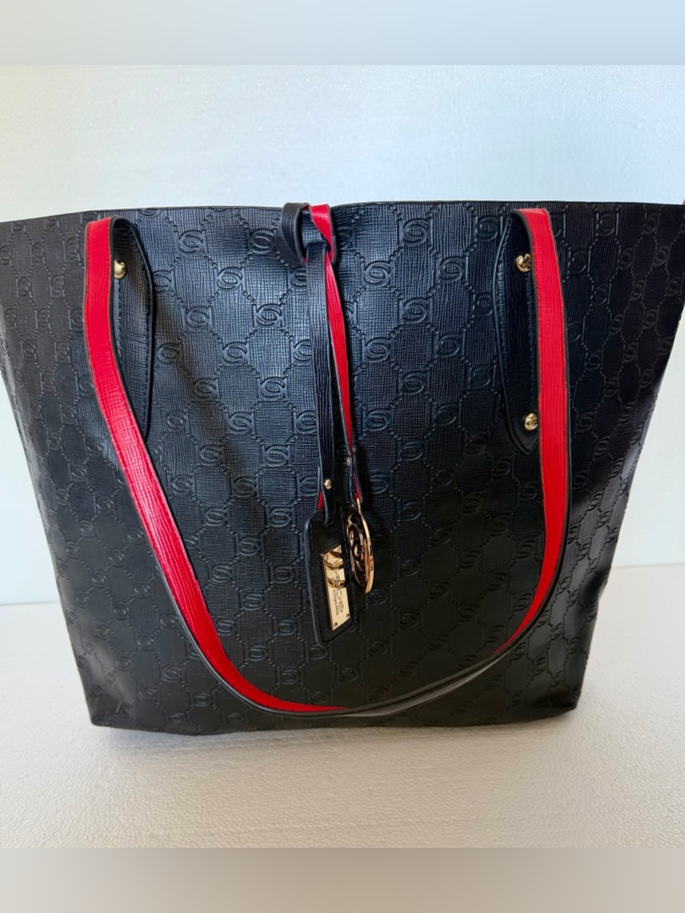 bebe Black Logo Embossed Tote Bag Red Interior